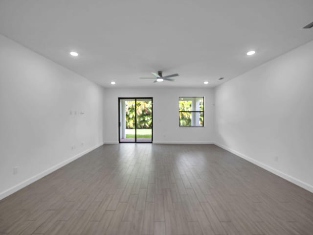 3181 Streng Ln, Royal Palm Beach, FL 33411 - empty room featuring ceiling fan, dark wood-type flooring, baseboards, and recessed lighting