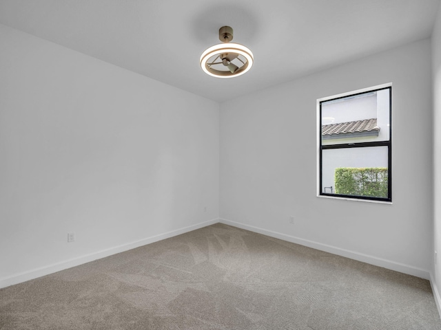 3181 Streng Ln, Royal Palm Beach, FL 33411 - carpeted spare room with baseboards