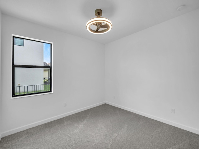 3181 Streng Ln, Royal Palm Beach, FL 33411 - unfurnished room with carpet, baseboards, and a smoke detector