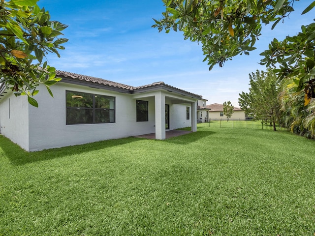 3181 Streng Ln, Royal Palm Beach, FL 33411 - view of yard featuring a patio