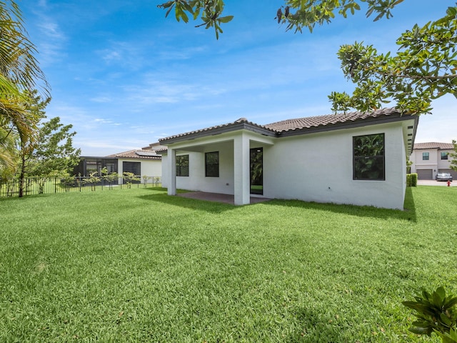 3181 Streng Ln, Royal Palm Beach, FL 33411 - back of house with a tiled roof, stucco siding, and a patio