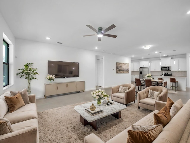3181 Streng Ln, Royal Palm Beach, FL 33411 - living area with recessed lighting, a ceiling fan, and baseboards