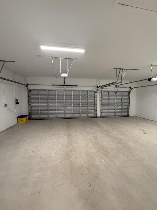3181 Streng Ln, Royal Palm Beach, FL 33411 - garage featuring a garage door opener