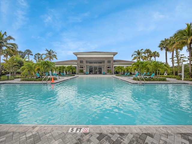 3181 Streng Ln, Royal Palm Beach, FL 33411 - community pool with a patio area