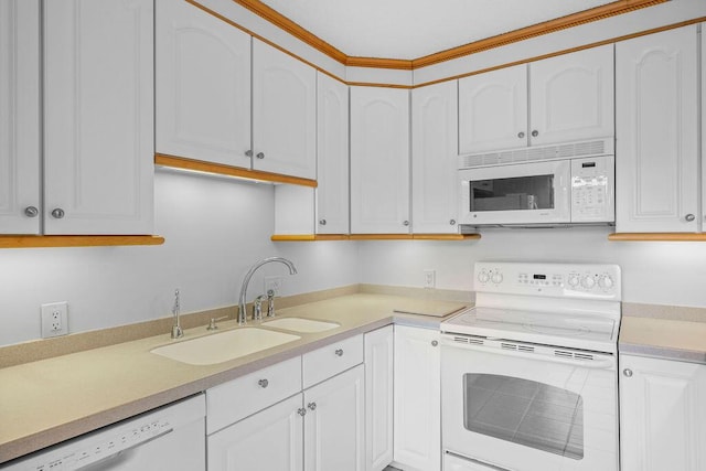 5642 SE Riverboat Dr Unit A5-120, Stuart, FL 34997 - kitchen with white appliances, a sink, white cabinetry, and light countertops