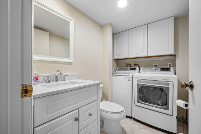 5642 SE Riverboat Dr Unit A5-120, Stuart, FL 34997 - bathroom featuring independent washer and dryer, toilet, and vanity