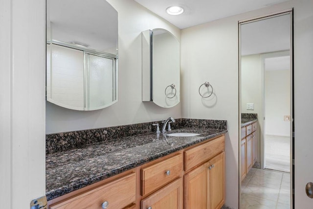 5642 SE Riverboat Dr Unit A5-120, Stuart, FL 34997 - bathroom with vanity, a stall shower, and marble finish flooring