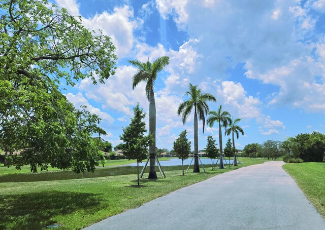 5890 Sugar Palm Ct Unit E, Delray Beach, FL 33484 - view of home's community with a yard and a water view