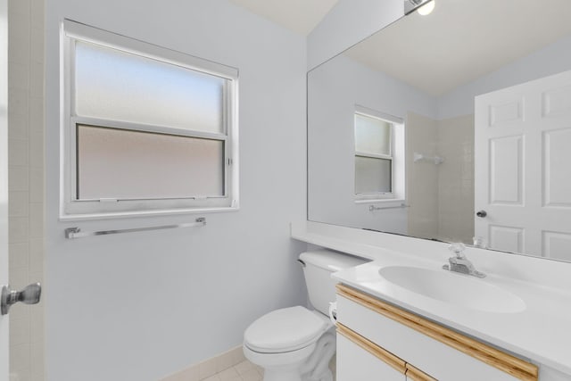 2281 SW Olympic Club Ter, Palm City, FL 34990 - full bath with toilet, vanity, tiled shower, and baseboards