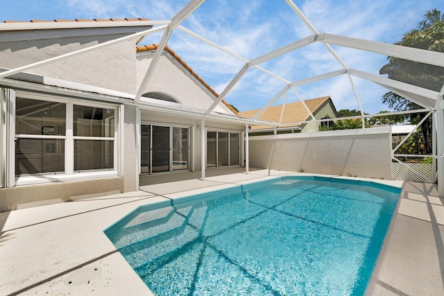2281 SW Olympic Club Ter, Palm City, FL 34990 - view of pool with a patio area and a lanai