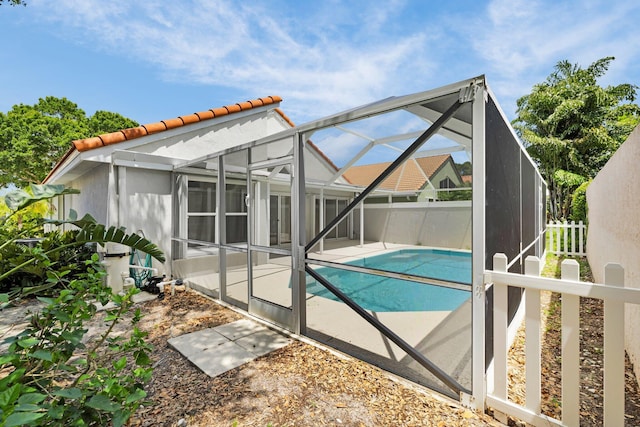 2281 SW Olympic Club Ter, Palm City, FL 34990 - view of pool with a patio area and glass enclosure
