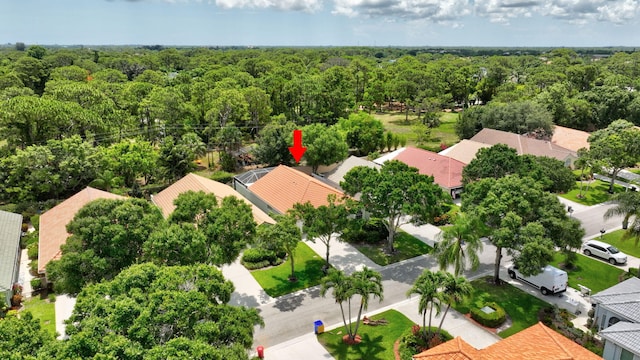 2281 SW Olympic Club Ter, Palm City, FL 34990 - aerial view of residential area with a heavily wooded area