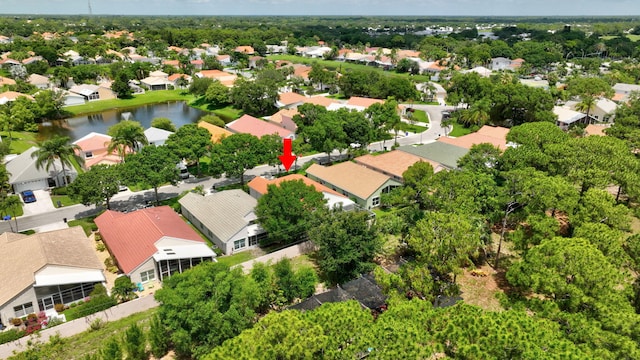 2281 SW Olympic Club Ter, Palm City, FL 34990 - aerial perspective of suburban area featuring a large body of water