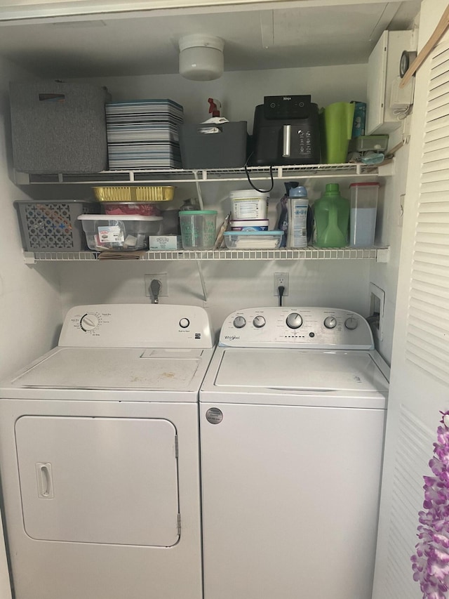 1701 Village Blvd Unit 112, West Palm Beach, FL 33409 - washroom with washing machine and dryer