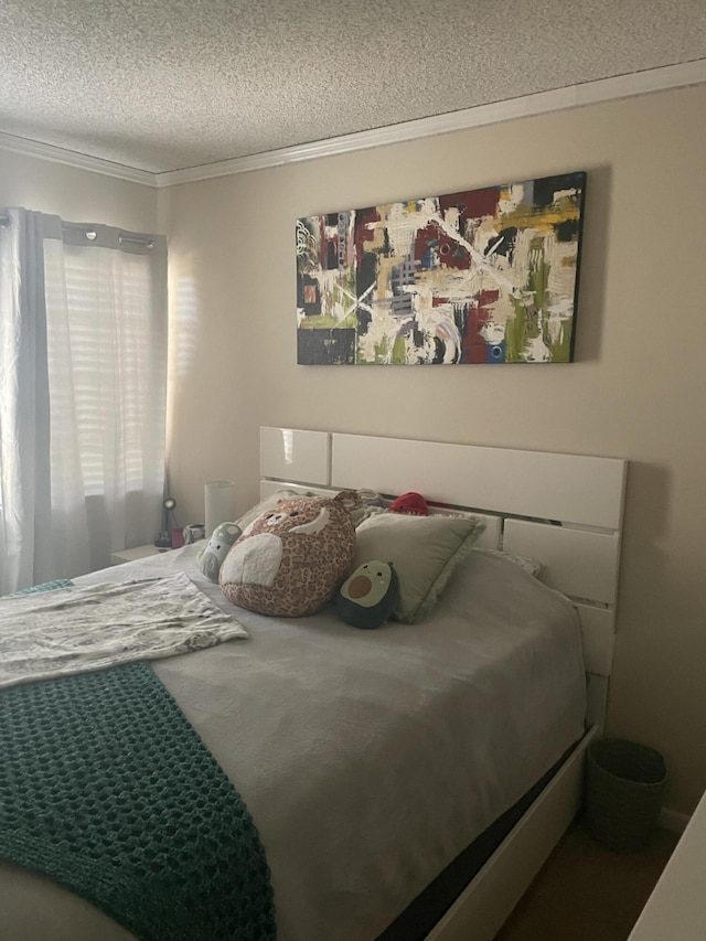 1701 Village Blvd Unit 112, West Palm Beach, FL 33409 - bedroom featuring a textured ceiling and ornamental molding