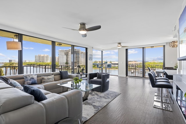 899 Jeffery St Unit 414, Boca Raton, FL 33487 - living area with ceiling fan, floor to ceiling windows, hardwood / wood-style floors, a water view, and a view of city