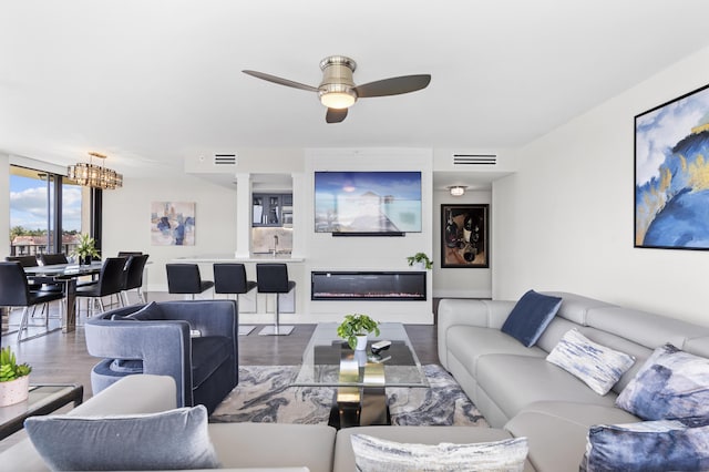 899 Jeffery St Unit 414, Boca Raton, FL 33487 - living area with wood finished floors and a ceiling fan