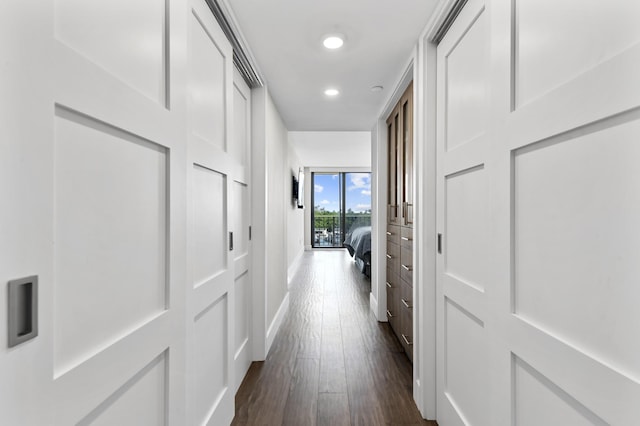 899 Jeffery St Unit 414, Boca Raton, FL 33487 - hallway with dark wood finished floors, baseboards, and recessed lighting