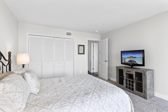 899 Jeffery St Unit 414, Boca Raton, FL 33487 - bedroom with a closet, baseboards, and carpet floors