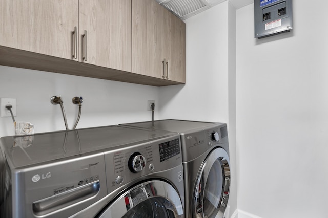 899 Jeffery St Unit 414, Boca Raton, FL 33487 - washroom with washer and clothes dryer and cabinet space
