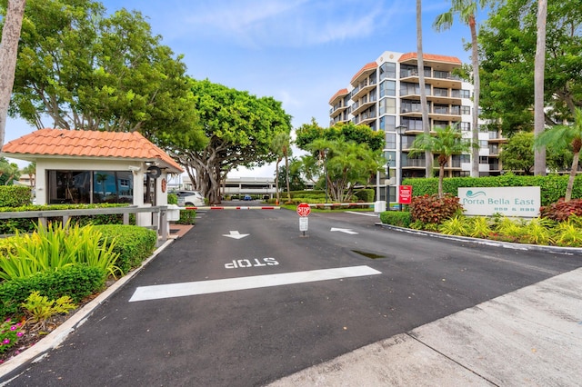 899 Jeffery St Unit 414, Boca Raton, FL 33487 - view of asphalt street with traffic signs and curbs