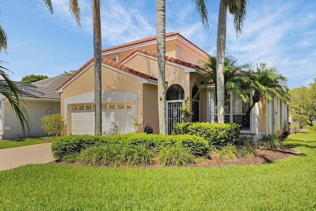 2274 SW Olympic Club Ter, Palm City, FL 34990 - mediterranean / spanish home featuring an attached garage, stucco siding, a tile roof, concrete driveway, and a front lawn