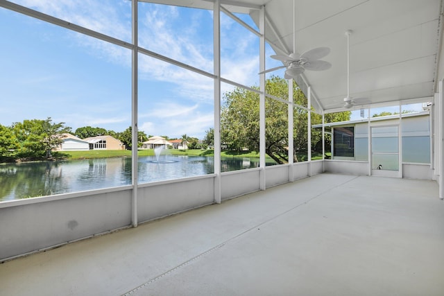 2274 SW Olympic Club Ter, Palm City, FL 34990 - unfurnished sunroom featuring a water view, a ceiling fan, and healthy amount of natural light