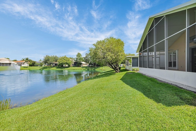 2274 SW Olympic Club Ter, Palm City, FL 34990 - view of green lawn with a water view