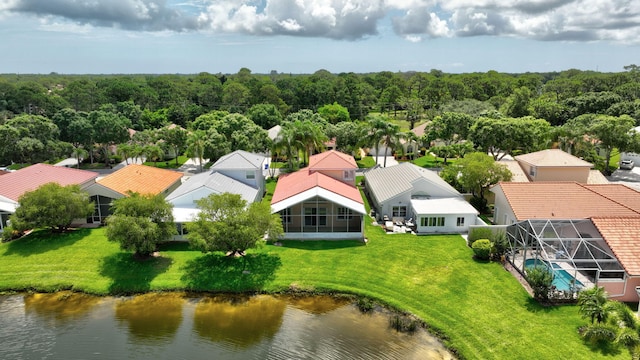 2274 SW Olympic Club Ter, Palm City, FL 34990 - aerial perspective of suburban area with a heavily wooded area and a nearby body of water