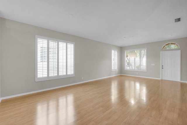 2274 SW Olympic Club Ter, Palm City, FL 34990 - unfurnished room featuring light wood-type flooring and baseboards