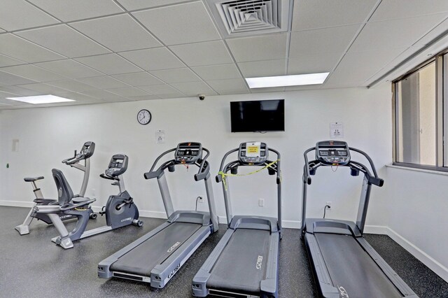 5600 N Flagler Dr Unit 605, West Palm Beach, FL 33407 - workout area with a drop ceiling and baseboards