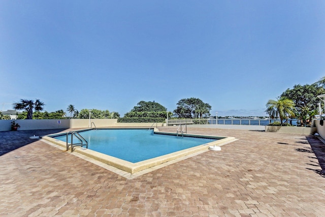 5600 N Flagler Dr Unit 605, West Palm Beach, FL 33407 - community pool featuring a patio area