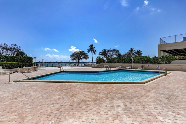 5600 N Flagler Dr Unit 605, West Palm Beach, FL 33407 - community pool featuring a patio