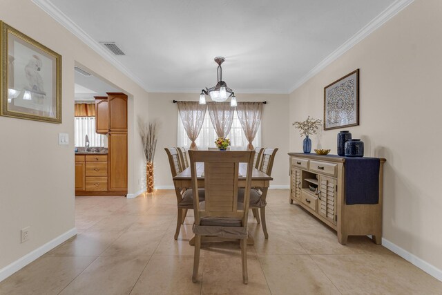 8858 SW 8th St, Boca Raton, FL 33433 - dining space featuring ornamental molding and light tile patterned floors