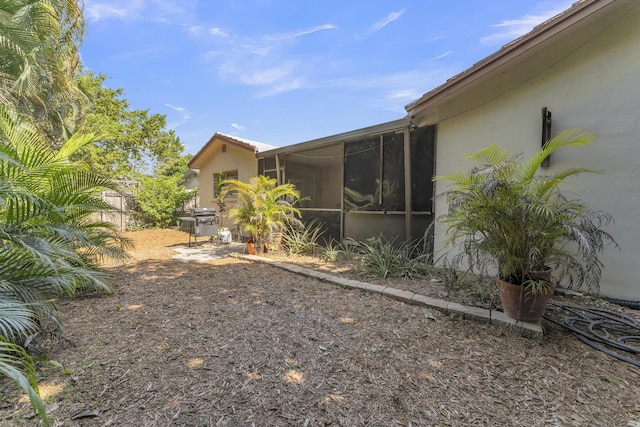 8858 SW 8th St, Boca Raton, FL 33433 - view of yard with a sunroom