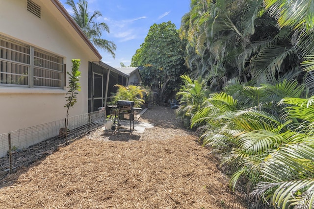 8858 SW 8th St, Boca Raton, FL 33433 - living area with crown molding and a ceiling fan