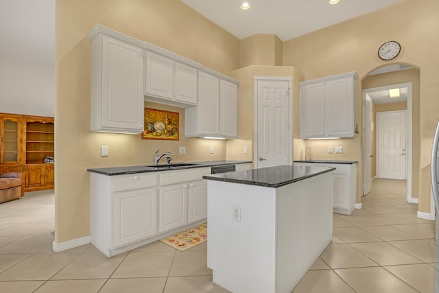 9466 Lantern Bay Cir, West Palm Beach, FL 33411 - kitchen with a sink, light tile patterned floors, white cabinets, and recessed lighting