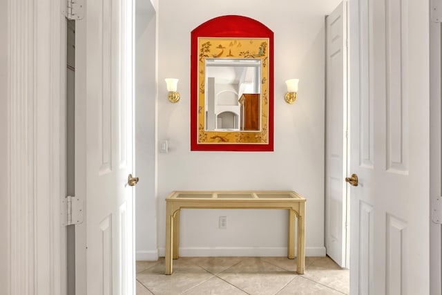 9466 Lantern Bay Cir, West Palm Beach, FL 33411 - hallway with light tile patterned floors and baseboards