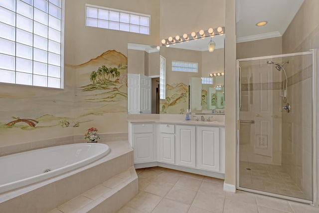 9466 Lantern Bay Cir, West Palm Beach, FL 33411 - bathroom with a tub with jets, a stall shower, vanity, tile patterned flooring, and ornamental molding