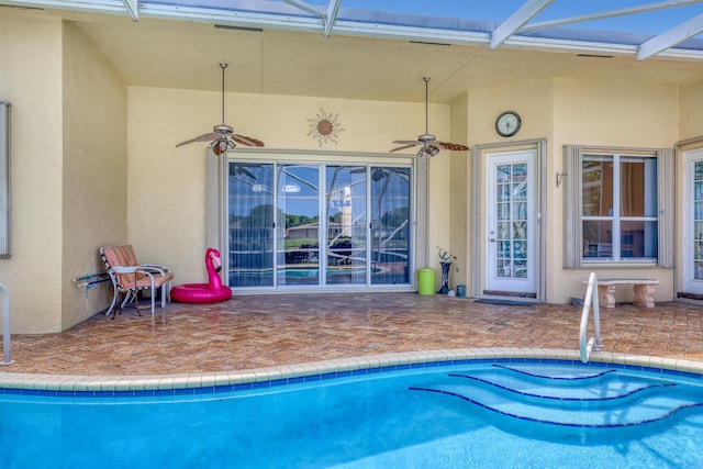 9466 Lantern Bay Cir, West Palm Beach, FL 33411 - swimming pool featuring a ceiling fan and a patio area