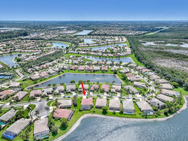 9466 Lantern Bay Cir, West Palm Beach, FL 33411 - aerial overview of property's location featuring nearby suburban area and a nearby body of water