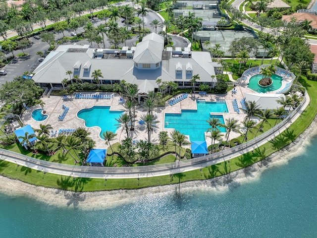 9466 Lantern Bay Cir, West Palm Beach, FL 33411 - drone / aerial view of a pool and a large body of water