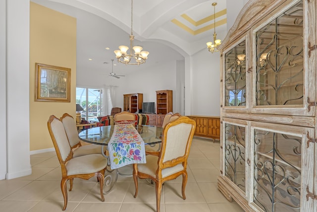 9466 Lantern Bay Cir, West Palm Beach, FL 33411 - dining area featuring a chandelier, arched walkways, light tile patterned flooring, a ceiling fan, and recessed lighting