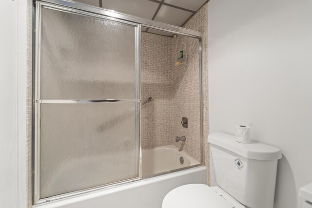 938 Normandy T 938, Delray Beach, FL 33484 - bathroom with toilet and combined bath / shower with glass door