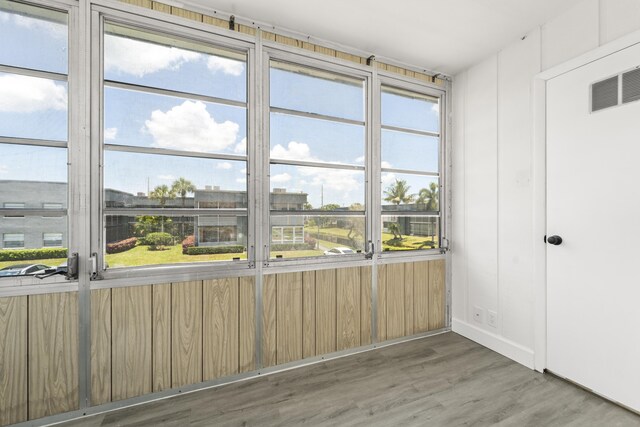 938 Normandy T 938, Delray Beach, FL 33484 - unfurnished sunroom with plenty of natural light