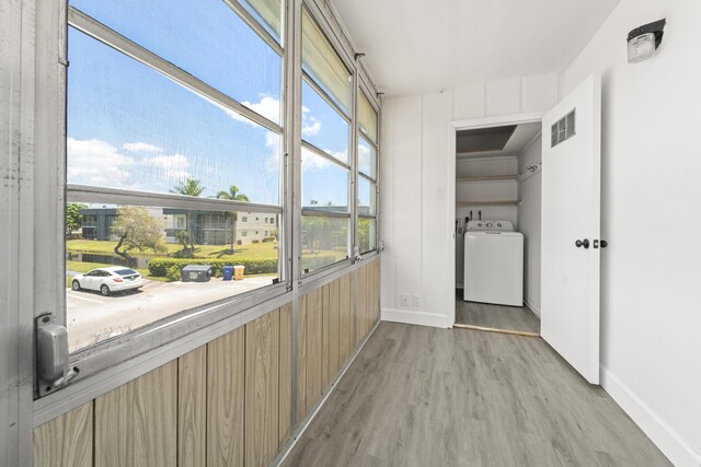 938 Normandy T 938, Delray Beach, FL 33484 - unfurnished sunroom with washer / clothes dryer