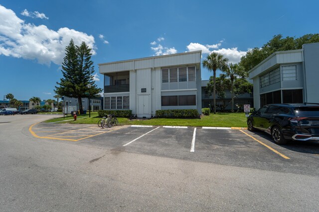 938 Normandy T 938, Delray Beach, FL 33484 - view of building exterior with uncovered parking