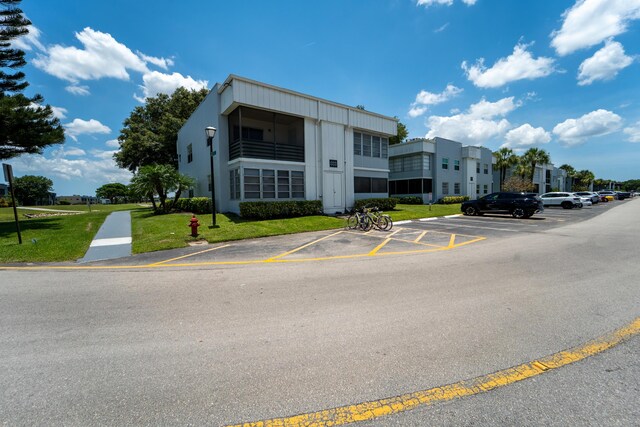 938 Normandy T 938, Delray Beach, FL 33484 - view of property with uncovered parking