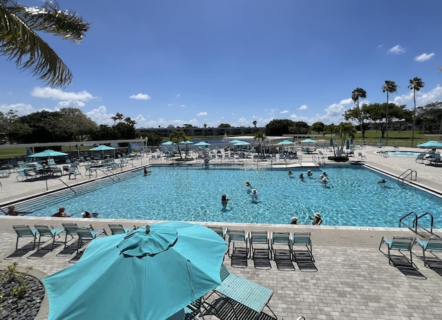 938 Normandy T 938, Delray Beach, FL 33484 - community pool featuring a patio area