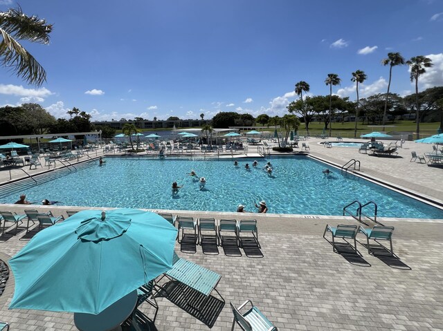 938 Normandy T 938, Delray Beach, FL 33484 - community pool with a patio and a grill